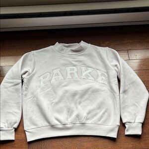 Price is Firm Ladies size S/M lilac and white Parke Mockneck sweatshirt
